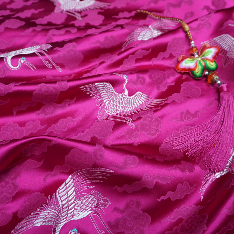 玫红色桃粉色祥云朵仙鹤织锦缎布料丝绸缎子面料云锦唐装汉服装饰