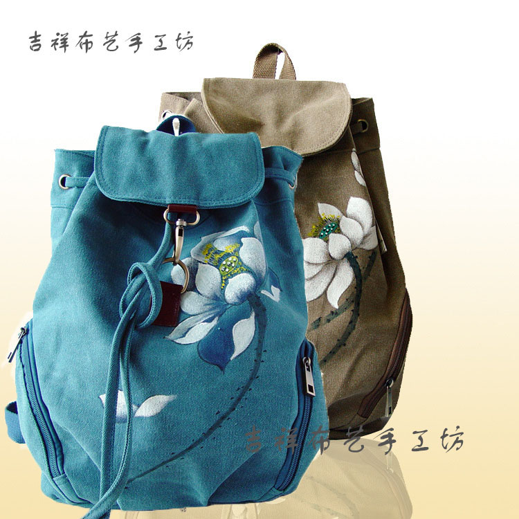新款手绘画花中国民族风双肩抽绳帆布包旅行登山时尚流行手提背包
