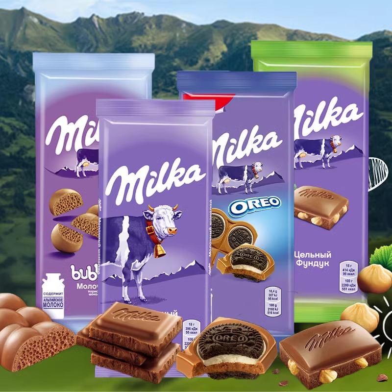 俄罗斯进口黑巧克力MILKA气泡牛奶榛仁网红妙卡奥利奥饼干夹心90g